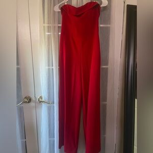 Red off-the-shoulder jumpsuit with back closure